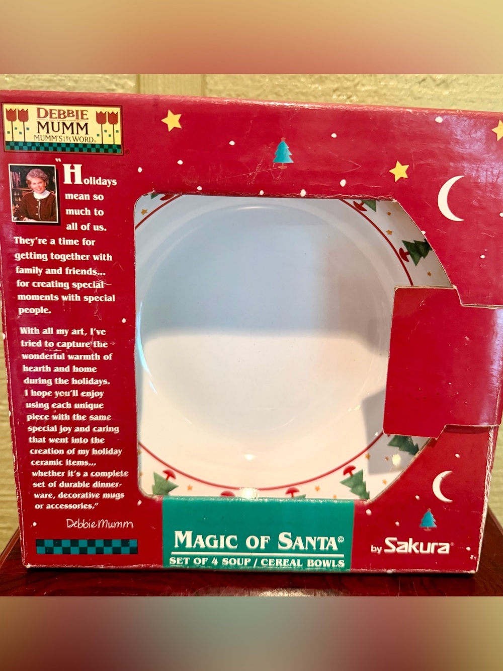 From my mom’s personal collection is this charming Debbie Mumm “Magic of Santa”